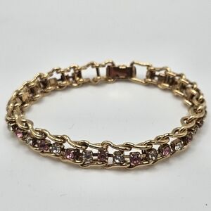VINTAGE Pink and Clear Prong Set Rhinestone Tennis Style Gold Tone Bracelet